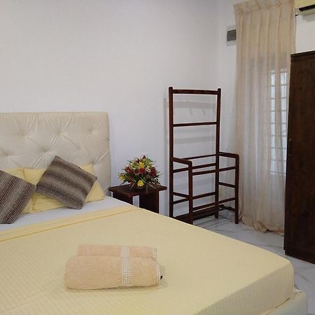 Living Home Negombo Cameră foto