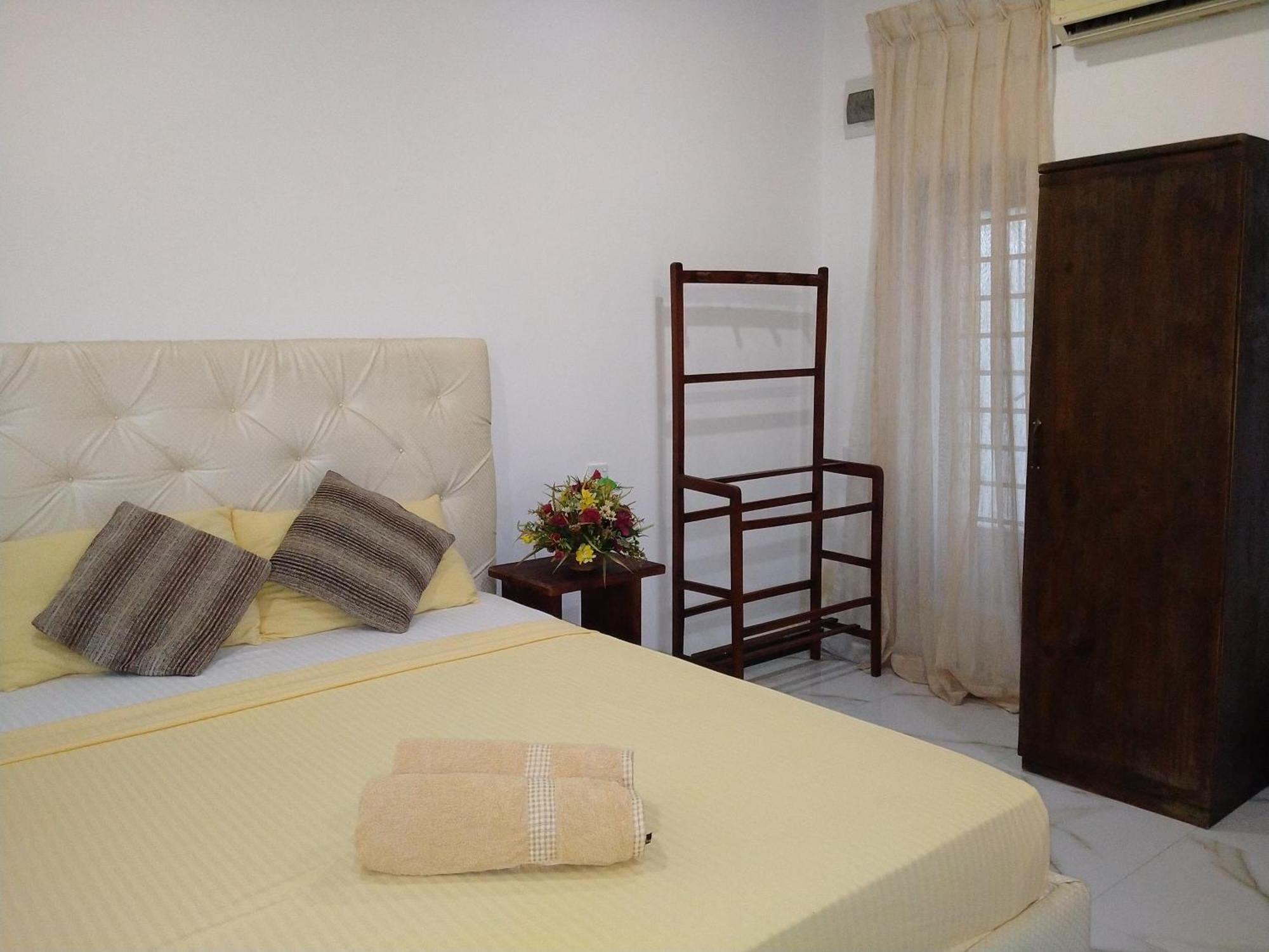 Living Home Negombo Cameră foto