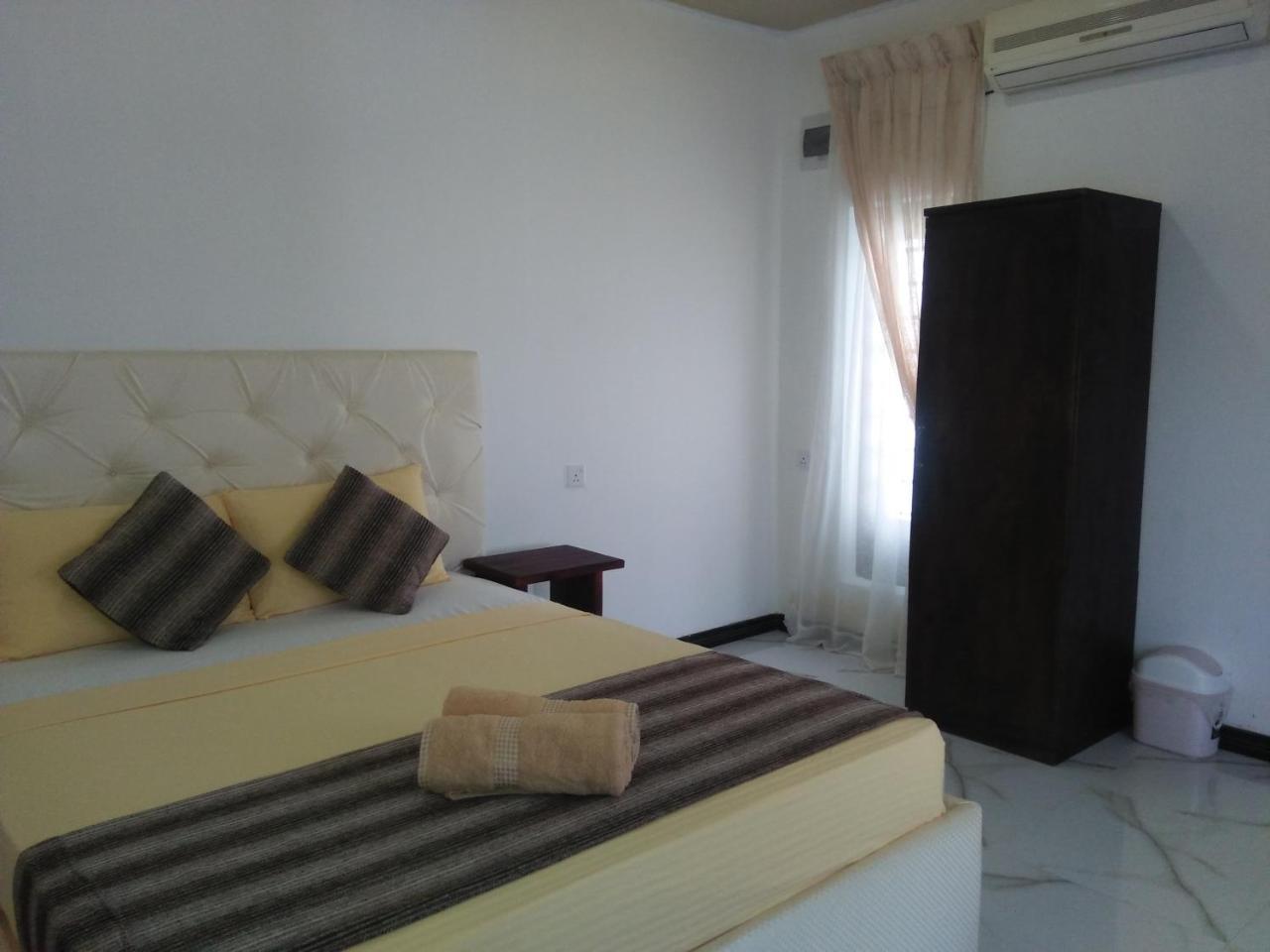 Living Home Negombo Cameră foto